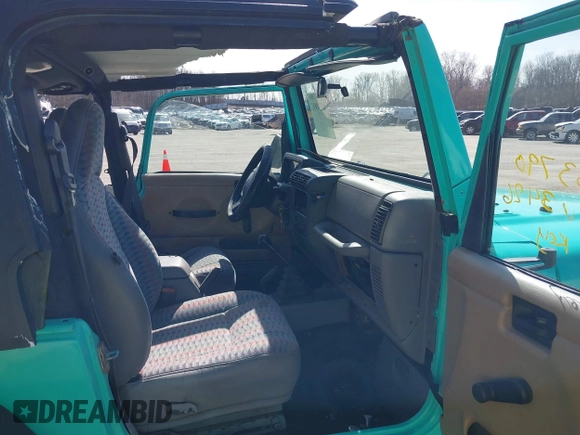 1997 Jeep Wrangler Sport with VIN 1J4FY19S2VP423426, listed as a IAAI auction lot 41734992 with 164,706 mi miles. Bid and sale history available at carsss.com. Image 5.