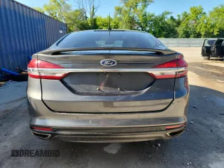 2017 Ford Fusion Titanium z VIN 3FA6P0D96HR251752, wystawiony jako Copart lot #61568705 z przebiegiem 173 479 mil mil oraz Nie do naprawy • Non repairable. Historia ofert i sprzedaży dostępna na DreamBid. Obrazek 6.