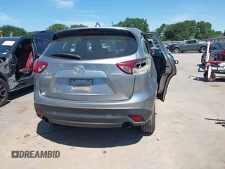 2014 Mazda CX-5 Sport with VIN JM3KE2BE7E0371203, listed as a IAAI auction lot 42243756 with 121,534 mi miles and . Bid and sale history available at DreamBid. Image 17.