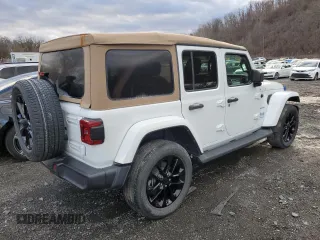 2021 Jeep Wrangler Unlimited Sahara с VIN 1C4JJXP62MW677073, выставлен на аукционе Copart как лот 61348075 с пробегом Не указан миль и Списание • Salvage title. История ставок и продаж доступна на DreamBid. Изображение 3.