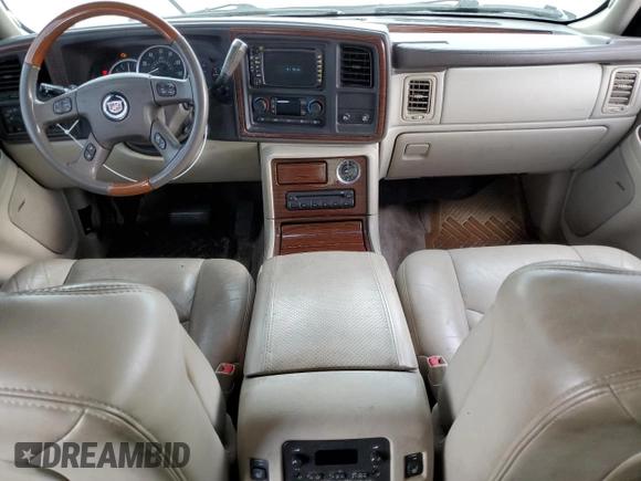 2004 Cadillac Escalade z VIN 1GYEK63N04R309148, wystawiony jako Copart lot #51259085 z przebiegiem 106 646 mil mil oraz Czysty tytuł • Clean title. Historia ofert i sprzedaży dostępna na DreamBid. Obrazek 8.
