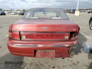 1993 Toyota Camry LE with VIN 4T1SK12E8PU240803, listed as a Copart auction lot 76663004 with 214,911 mi miles and Salvage Title. Bid and sale history available at carsss.com. Image 6.