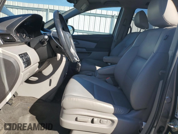 2014 Honda Odyssey Touring with VIN 5FNRL5H96EB061876, listed as a Copart auction lot 49759935 with 132,591 mi miles and Salvage Title. Bid and sale history available at DreamBid. Image 7.