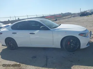 2018 Alfa Romeo Giulia Ti Sport with VIN ZARFAEEN9J7572787, listed as a IAAI auction lot 41646814 with 56,094 mi miles. Bid and sale history available at carsss.com. Image 13.