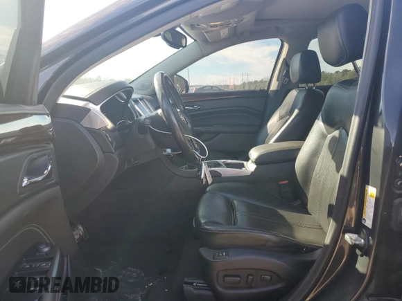 2015 Cadillac SRX Luxury Collection z VIN 3GYFNBE36FS608322, wystawiony jako Copart lot #88860835 z przebiegiem 141 627 mil mil oraz Szkoda całkowita • Salvage title. Historia ofert i sprzedaży dostępna na DreamBid. Obrazek 7.