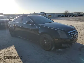 2013 Cadillac CTS Luxury z VIN 1G6DE5E5XD0162473, wystawiony jako Copart lot #48684185 z przebiegiem 128 801 mil mil oraz Czysty tytuł • Clean title. Historia ofert i sprzedaży dostępna na DreamBid. Obrazek 4.