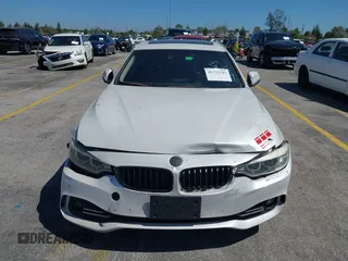 2015 BMW 4 Series 428i with VIN WBA4A5C58FGK15335, listed as a IAAI auction lot 41723243 with 152,652 mi miles and . Bid and sale history available at DreamBid. Image 6.