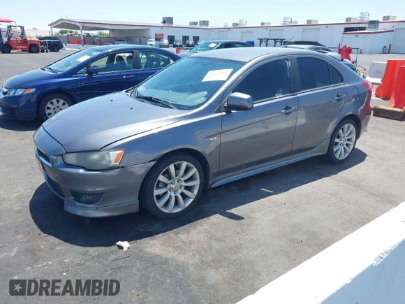 2010 Mitsubishi Lancer GTS z VIN JA32X8HW6AU005689, wystawiony jako IAAI lot #42467923 z przebiegiem 166 508 mil mil oraz . Historia ofert i sprzedaży dostępna na DreamBid. Obrazek 2.