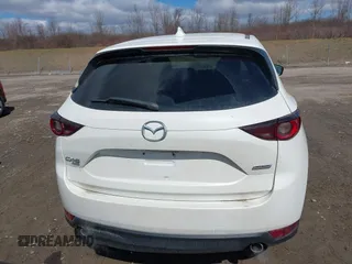 2019 Mazda CX-5 Touring with VIN JM3KFBCMXK0595905, listed as a IAAI auction lot 41934373 with 83,020 mi miles. Bid and sale history available at carsss.com. Image 16.