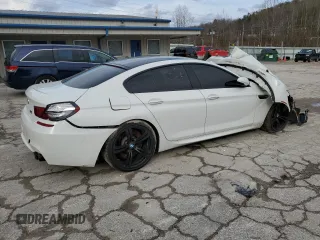 2015 BMW M6 z VIN WBS6C9C58FD467982, wystawiony jako Copart lot #78689983 z przebiegiem Nie podano mil oraz Szkody całkowita. Historia ofert i sprzedaży dostępna na DreamBid. Obrazek 3.