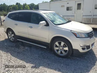 2014 Chevrolet Traverse LTZ z VIN 1GNKRJKD7EJ175097, wystawiony jako Copart lot #56717045 z przebiegiem 113 041 mil mil oraz Szkoda całkowita • Salvage title. Historia ofert i sprzedaży dostępna na DreamBid. Obrazek 4.