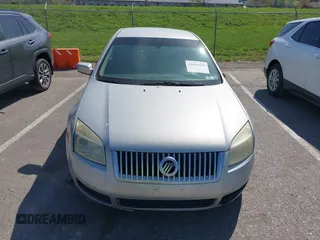 2006 Mercury Milan z VIN 3MEFM07146R611363, wystawiony jako IAAI lot #42047838 z przebiegiem 191 062 mil mil oraz . Historia ofert i sprzedaży dostępna na DreamBid. Obrazek 12.