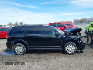 2017 Dodge Journey SE z VIN 3C4PDCAB2HT698940, wystawiony jako IAAI lot #41843176 z przebiegiem 141 499 mil mil oraz . Historia ofert i sprzedaży dostępna na DreamBid. Obrazek 13.