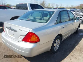 2002 Toyota Avalon XL with VIN 4T1BF28B52U265710, listed as a IAAI auction lot 42102300 with 99,901 mi miles and . Bid and sale history available at DreamBid. Image 4.