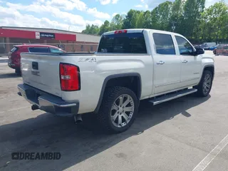 2014 GMC Sierra 1500 SLT with VIN 3GTU2VEC5EG548784, listed as a IAAI auction lot 42156738 with 118,809 mi miles and . Bid and sale history available at DreamBid. Image 4.