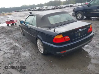 2004 BMW 3 Series 325Ci with VIN WBABW33404PL33722, listed as a IAAI auction lot 42107847 with 88,883 mi miles. Bid and sale history available at carsss.com. Image 3.