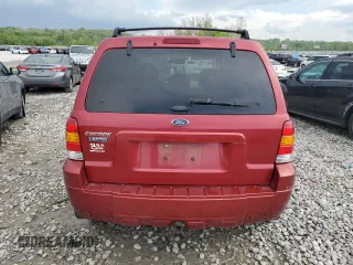 2005 Ford Escape Limited with VIN 1FMYU04165KA33277, listed as a Copart auction lot 54407625 with 217,317 mi miles and Salvage title. Bid and sale history available at DreamBid. Image 6.