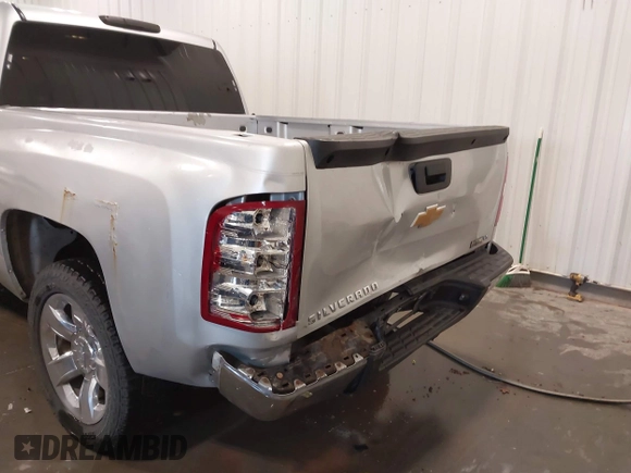 2013 Chevrolet Silverado 1500 LS with VIN 3GCPKREA1DG156984, listed as a IAAI auction lot 41924312 with 117,018 mi miles and . Bid and sale history available at DreamBid. Image 6.