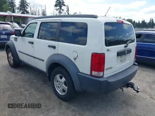 2007 Dodge Nitro SXT with VIN 1D8GT28K37W597001, listed as a IAAI auction lot 42350016 with 104,535 mi miles and . Bid and sale history available at DreamBid. Image 3.