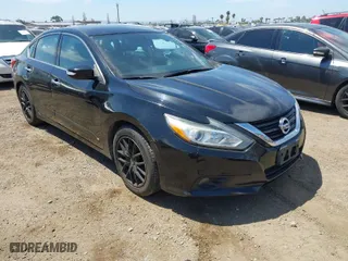 2017 Nissan Altima 2.5 SR with VIN 1N4AL3AP9HC151928, listed as a IAAI auction lot 42020334 with 136,101 mi miles. Bid and sale history available at carsss.com. Image 1.
