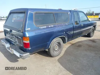 1994 Toyota 2WD Pickups DX with VIN JT4RN93P5R5103730, listed as a IAAI auction lot 42164918 with 396,623 mi miles. Bid and sale history available at carsss.com. Image 4.