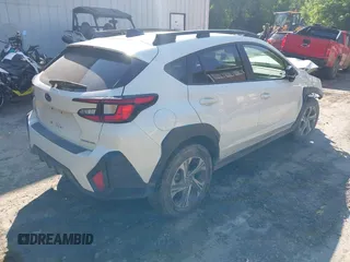 2024 Subaru Crosstrek Premium z VIN JF2GUADC0R8873664, wystawiony jako IAAI lot #42395857 z przebiegiem 11 924 mil mil oraz . Historia ofert i sprzedaży dostępna na DreamBid. Obrazek 4.