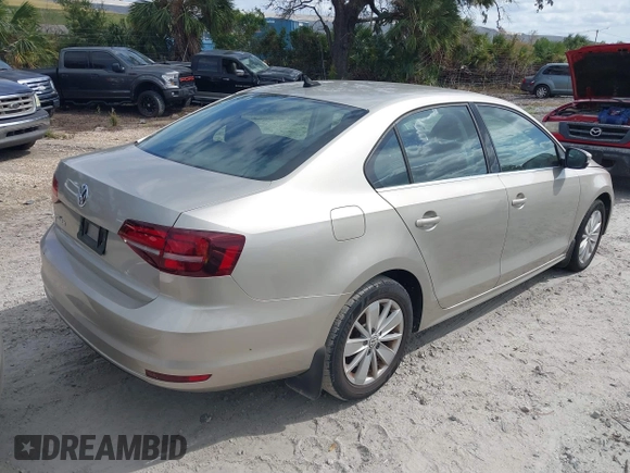 2016 Volkswagen Jetta Sedan 1.4T SE with VIN 3VWD67AJ9GM321104, listed as a IAAI auction lot 40633152 with 126,335 mi miles. Bid and sale history available at carsss.com. Image 4.