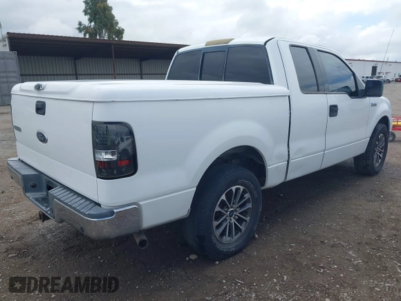 2004 Ford F-150 XLT with VIN 1FTRX12594KD71332, listed as a IAAI auction lot 42138488 with 170,234 mi miles. Bid and sale history available at carsss.com. Image 4.