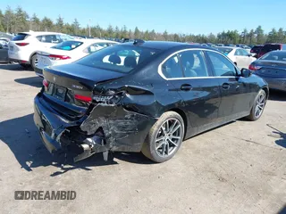 2019 BMW 3 Series 330i xDrive with VIN WBA5R7C59KFH30971, listed as a IAAI auction lot 42005244 with 59,514 mi miles and . Bid and sale history available at DreamBid. Image 4.