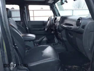 2017 Jeep Wrangler Unlimited Sahara with VIN 1C4BJWEG8HL638067, listed as a IAAI auction lot 41274352 with 57,339 mi miles. Bid and sale history available at carsss.com. Image 5.