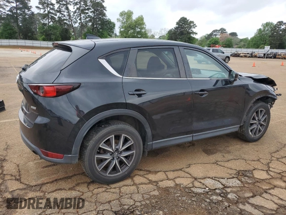 2018 Mazda CX-5 Touring with VIN JM3KFACM4J1326270, listed as a Copart auction lot 51731985 with 87,129 mi miles and Salvage Title. Bid and sale history available at carsss.com. Image 3.