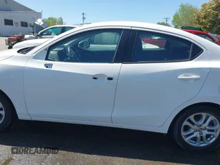 2016 Scion iA z VIN 3MYDLBZVXGY122157, wystawiony jako IAAI lot #41991308 z przebiegiem 133 026 mil mil oraz . Historia ofert i sprzedaży dostępna na DreamBid. Obrazek 14.