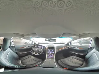 2015 Lincoln MKZ z VIN 3LN6L2GK4FR613117, wystawiony jako Copart lot #54141735 z przebiegiem 129 072 mil mil oraz Szkoda całkowita • Salvage title. Historia ofert i sprzedaży dostępna na DreamBid. Obrazek 14.