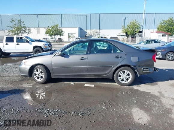2004 Toyota Camry LE with VIN 4T1BF30K94U577260, listed as a IAAI auction lot 41906287 with 68,499 mi miles. Bid and sale history available at carsss.com. Image 15.