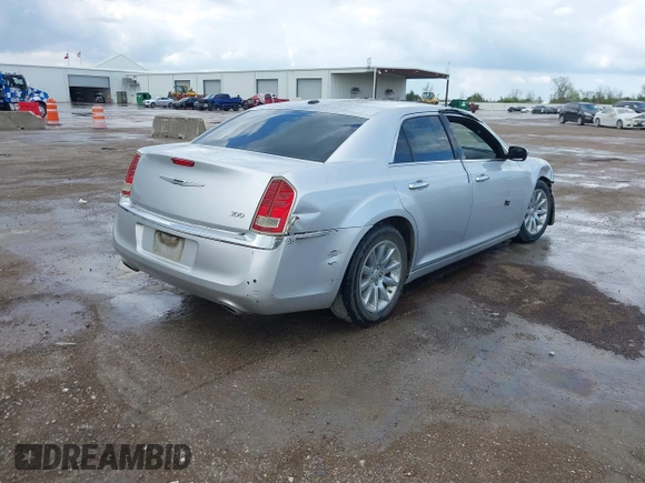2012 Chrysler 300 Limited with VIN 2C3CCACGXCH212881, listed as a IAAI auction lot 41882643 with 160,645 mi miles. Bid and sale history available at carsss.com. Image 4.