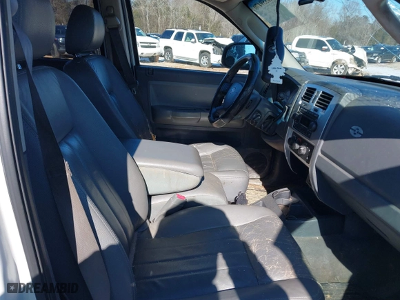 2005 Dodge Dakota Laramie with VIN 1D7HE58N35S138912, listed as a IAAI auction lot 41359470 with 263,136 mi miles. Bid and sale history available at carsss.com. Image 5.