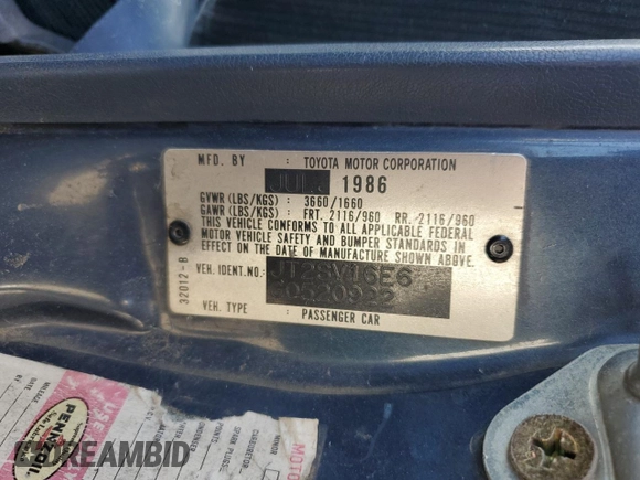 1986 Toyota Camry z VIN JT2SV16E6G0520922, wystawiony jako Copart lot #47146675 z przebiegiem 156 394 mil mil oraz Szkoda całkowita • Salvage title. Historia ofert i sprzedaży dostępna na DreamBid. Obrazek 13.