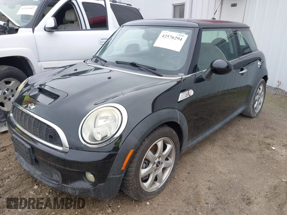 2010 MINI Hardtop S with VIN WMWMF7C52ATZ69084, listed as a IAAI auction lot 42576294 with Not provided miles and . Bid and sale history available at DreamBid. Image 2.