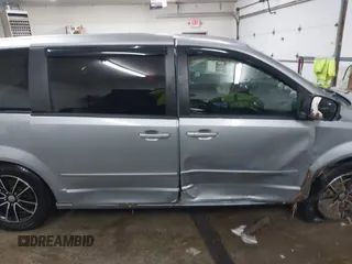 2015 Dodge Grand Caravan SE with VIN 2C4RDGBG9FR703691, listed as a IAAI auction lot 41395564 with 170,735 mi miles and . Bid and sale history available at DreamBid. Image 14.