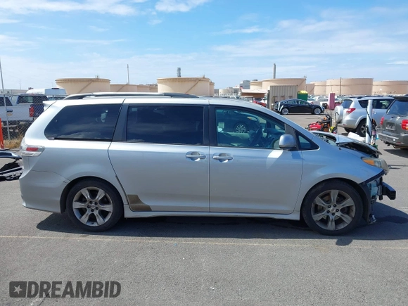 2011 Toyota Sienna SE with VIN 5TDXK3DC5BS062055, listed as a IAAI auction lot 42140951 with 141,539 mi miles and . Bid and sale history available at DreamBid. Image 14.