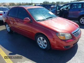 2009 Kia Spectra EX with VIN KNAFE221195606045, listed as a IAAI auction lot 41764519 with 124,577 mi miles. Bid and sale history available at carsss.com. Image 1.