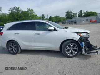2017 Kia Sorento SXL z VIN 5XYPK4A58HG251610, wystawiony jako IAAI lot #42351313 z przebiegiem 147 527 mil mil oraz . Historia ofert i sprzedaży dostępna na DreamBid. Obrazek 13.