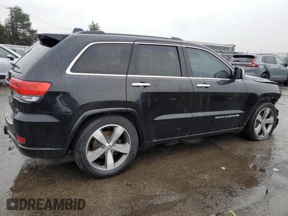 2015 Jeep Grand Cherokee Overland with VIN 1C4RJFCG7FC925995, listed as a Copart auction lot 85421214 with 142,266 mi miles and Salvage Title. Bid and sale history available at carsss.com. Image 3.