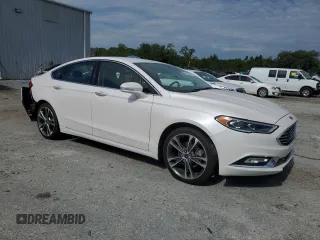2017 Ford Fusion Titanium с VIN 3FA6P0K96HR161679, выставлен на аукционе Copart как лот 61237935 с пробегом 66 680 миль миль и Списание • Salvage title. История ставок и продаж доступна на DreamBid. Изображение 4.
