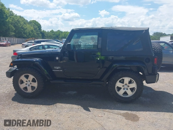 2010 Jeep Wrangler Sahara z VIN 1J4AA5D16AL110711, wystawiony jako IAAI lot #42751095 z przebiegiem 266 079 mil mil oraz . Historia ofert i sprzedaży dostępna na DreamBid. Obrazek 14.
