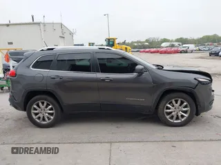 2014 Jeep Cherokee Limited z VIN 1C4PJMDB2EW182111, wystawiony jako IAAI lot #42179182 z przebiegiem 156 257 mil mil oraz . Historia ofert i sprzedaży dostępna na DreamBid. Obrazek 13.
