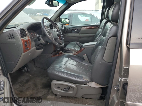 2002 GMC Envoy SLT z VIN 1GKDT13S422468756, wystawiony jako Copart lot #46510595 z przebiegiem 146 924 mil mil oraz Szkoda całkowita • Salvage title. Historia ofert i sprzedaży dostępna na DreamBid. Obrazek 7.