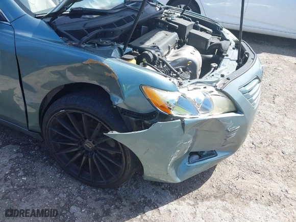 2009 Toyota Camry with VIN 4T1BE46KX9U887960, listed as a IAAI auction lot 41727053 with 130,300 mi miles. Bid and sale history available at carsss.com. Image 6.