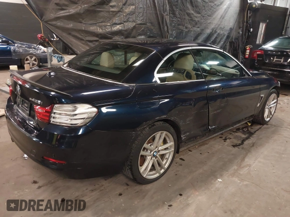 2015 BMW 4 Series 428i xDrive with VIN WBA3T1C59FP820155, listed as a IAAI auction lot 41077810 with 78,029 mi miles and . Bid and sale history available at carsss.com. Image 4.