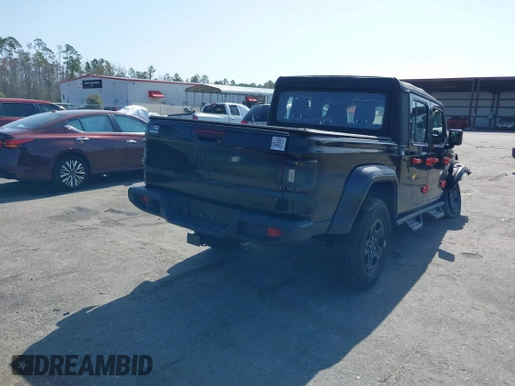 2022 Jeep Gladiator Texas Trail with VIN 1C6HJTAGXNL101704, listed as a IAAI auction lot 41590378 with 29,299 mi miles and . Bid and sale history available at DreamBid. Image 4.
